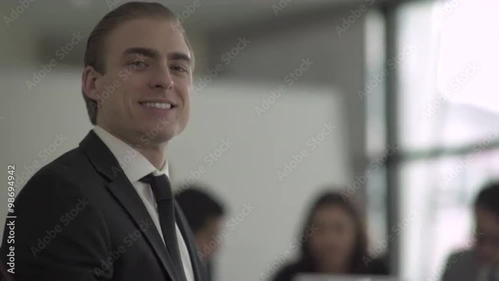 Group of attractive professionals involved in meeting Group of attractive professionals involved in meeting