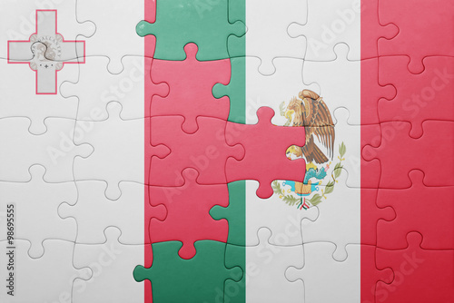 puzzle with the national flag of malta and mexico photo