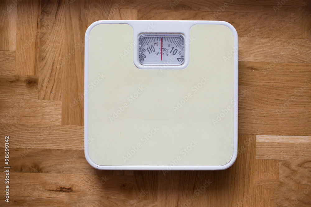 bathroom scale - diet and overweight concept
