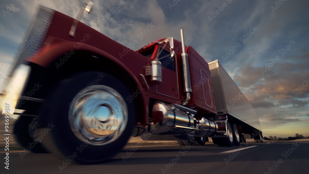 Oncoming huge semi-trailer truck riding on the highway. Closeup animation. HD