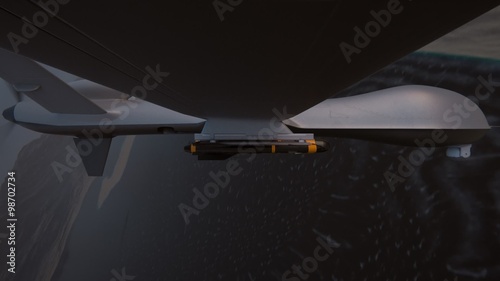 Military predator drone flying at night. Armed intelligent unmanned vehicle.