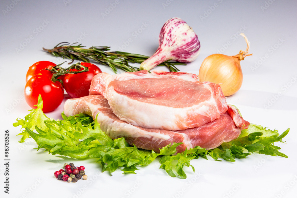 Pieces of carbonate of pork with vegetables and spices. Not iso Pieces of carbonate of pork with vegetables and spices. Not iso