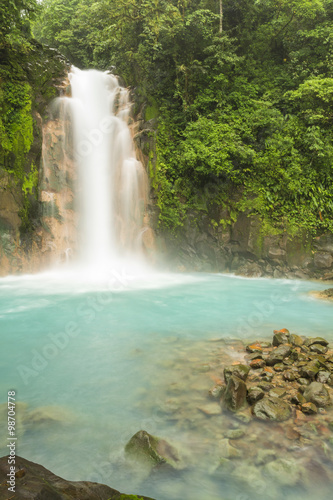 Rio Celeste Waterfall and Sulphurous Rocks
