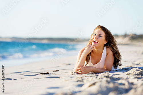 Young woman relaxing on the beach