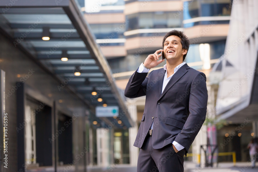 Portrait of confident businessman with mobile phone outdoors Portrait of confident businessman with mobile phone outdoors