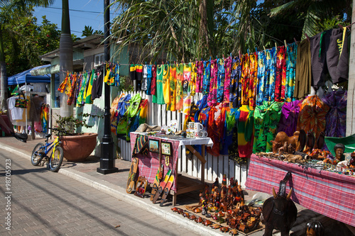 Colorful souvenirs and clothing for sale to tourists, Falmouth, Jamaica photo
