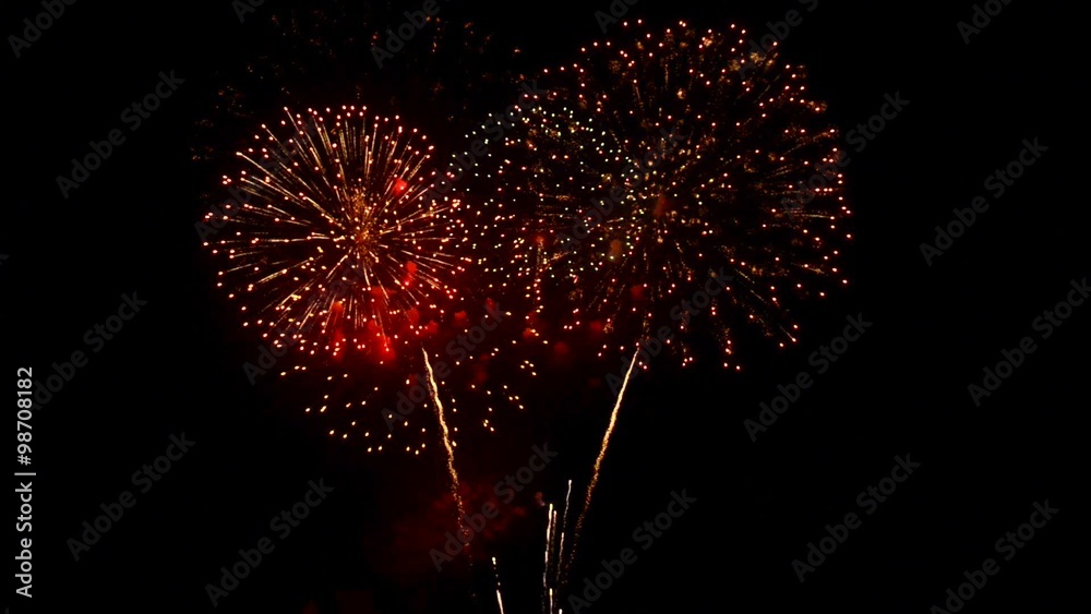Fireworks of various colors bursting 