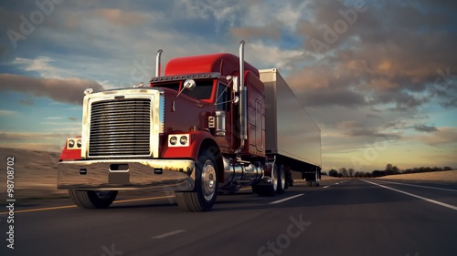 Red Semi Truck with White Trailer Driving on Desert Highway