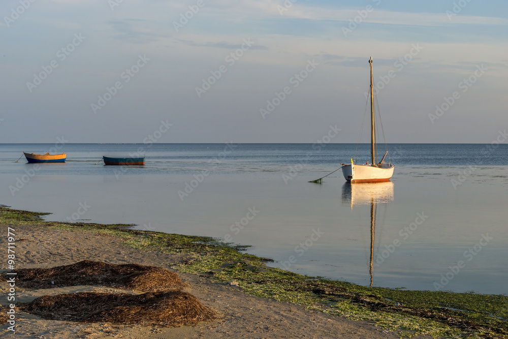 Small fishing boat, on the beach, of Baltic sea, Poland, nature