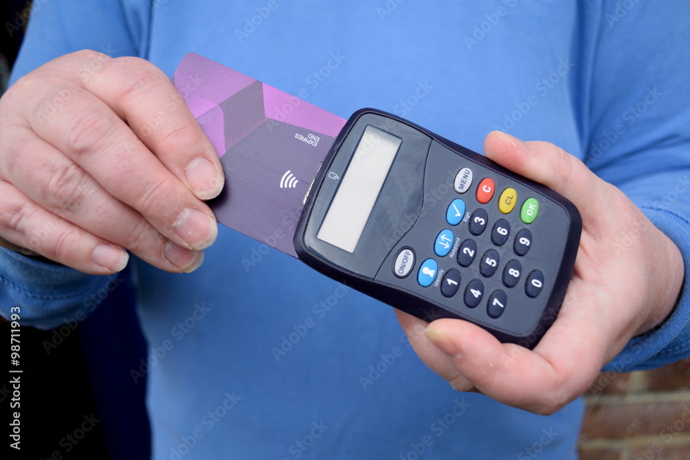 Person using device for online banking Person using device for online banking