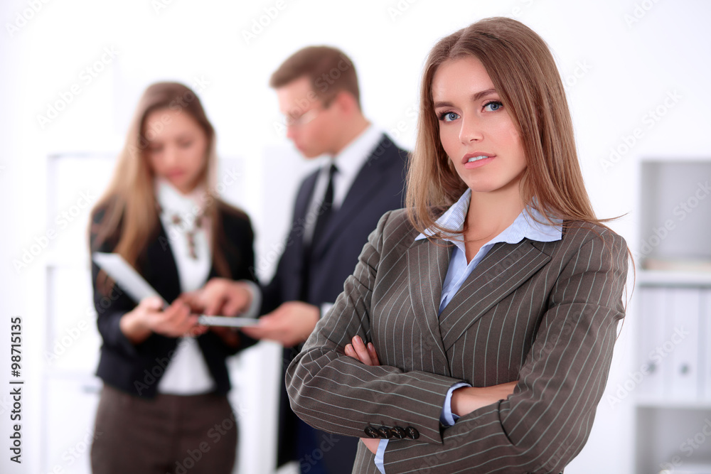 Face of beautiful cheerful smiling business woman on the background of business people Successful business concept Face of beautiful cheerful smiling business woman on the background of business people Successful business concept