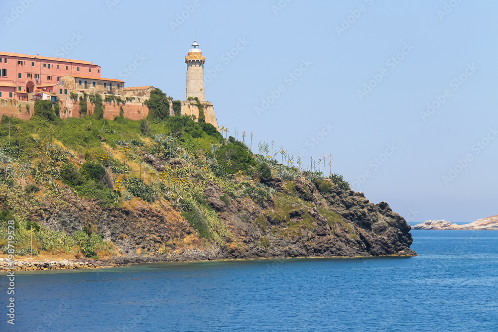 The lighthouse on the hill in Portoferraio, the main port of Elb