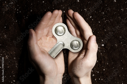 Fotografie Key winder in palms