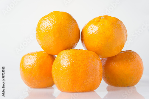 Orange fruit on white background.