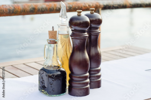 Salt and pepper mills on restoran table