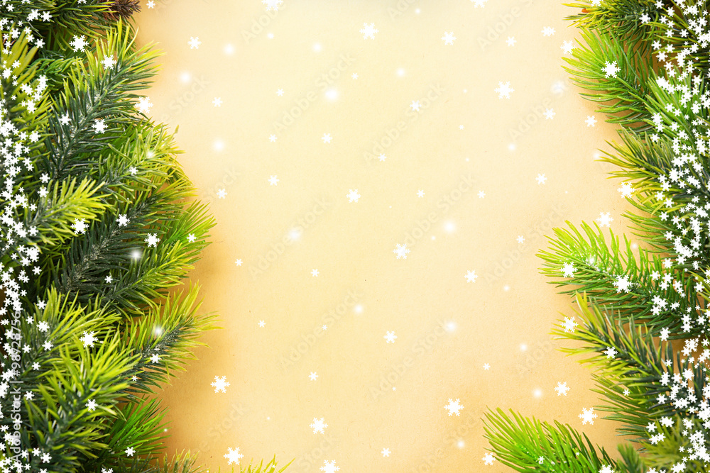 Christmas fir tree branches on paper background Christmas fir tree branches on paper background