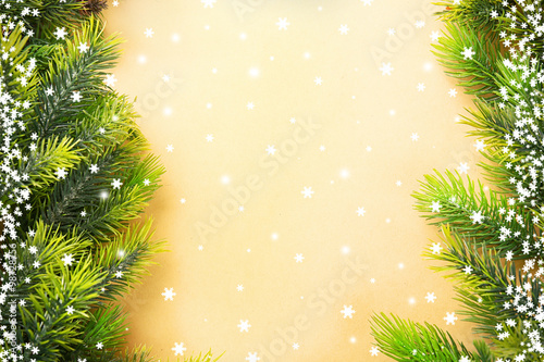 Christmas fir tree branches on paper background