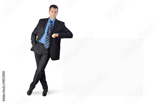 Φωτογραφία Businessman with his arm leaning on something
