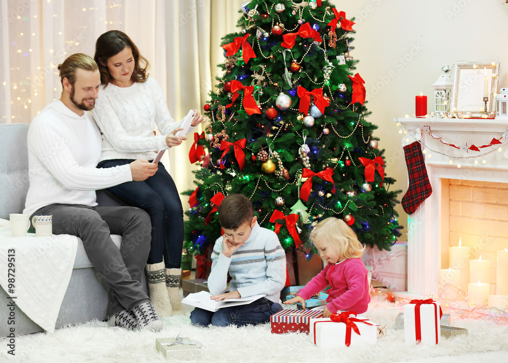 Christmas family portrait in home holiday living room Christmas family portrait in home holiday living room