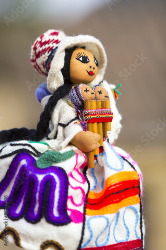 Colored colored puppet isolated on blurred background in Cusco
