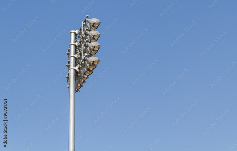 Fototapeta premium Spotlights soccer stadium with blue sky