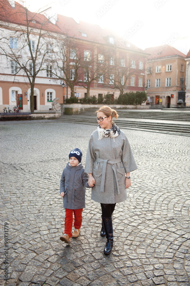 Mother and son at the old European city 