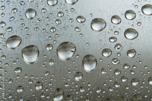 Water drops on the metal closeup