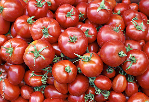 Many of juicy ripe red tomatoes