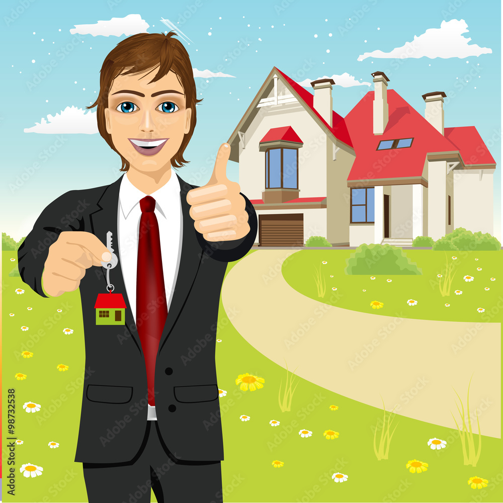 real estate agent holding the key of a new house real estate agent holding the key of a new house