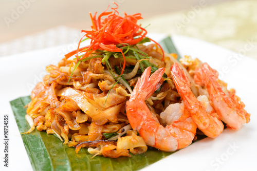 Stir fried penang char kway teow with big prawn photo