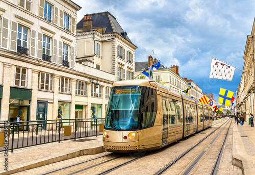 Tram on Jeanne d'Arc street in Orleans - France photo