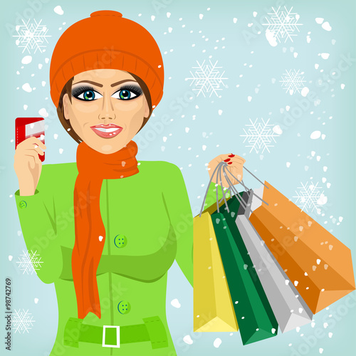 woman shopping on christmas winter day photo