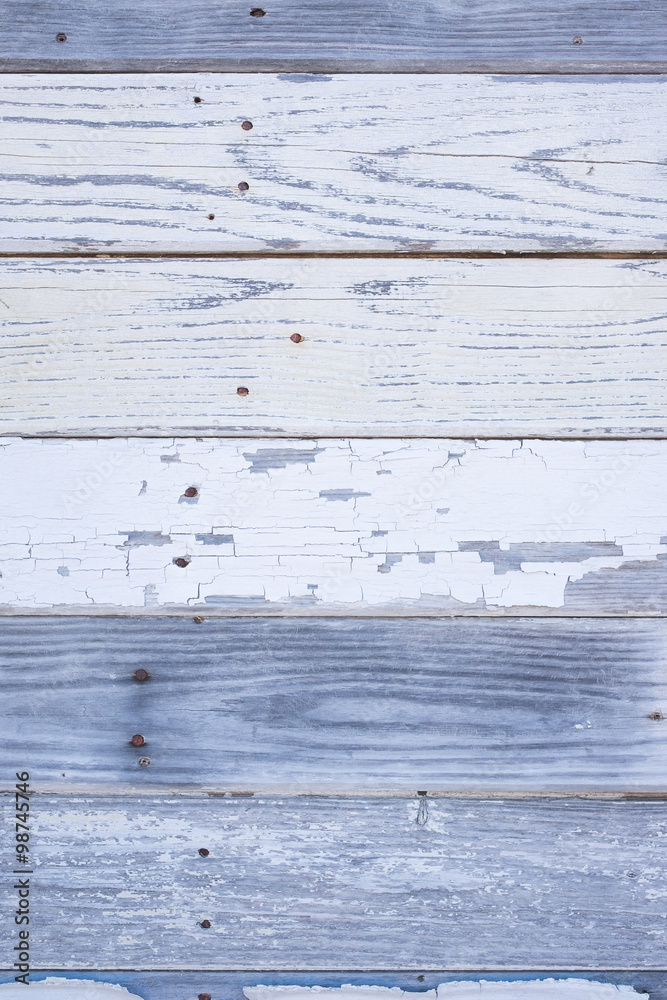 Naklejka premium Wood Wall With Peeling White Paint and Bleached Wood
