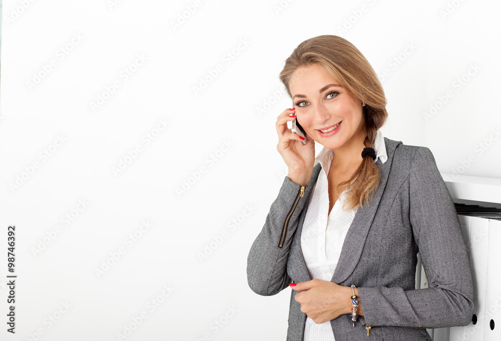 Portrait of a business woman talking on the phone