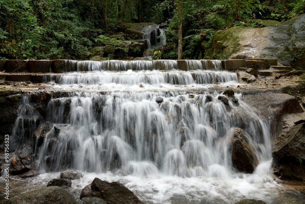 Fototapeta premium Small waterfall in the rainy season