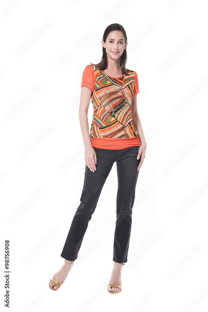 Full body fashion model in fashion dress standing posing in the studio
Full body fashion model in fashion dress standing posing in the studio