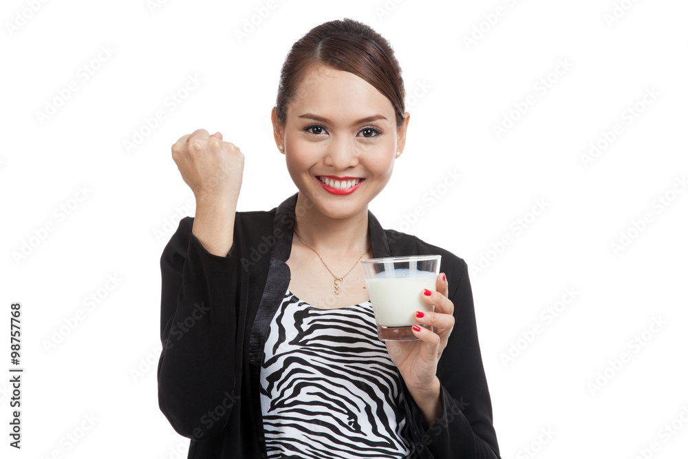 Healthy Asian woman drinking a glass of milk Healthy Asian woman drinking a glass of milk