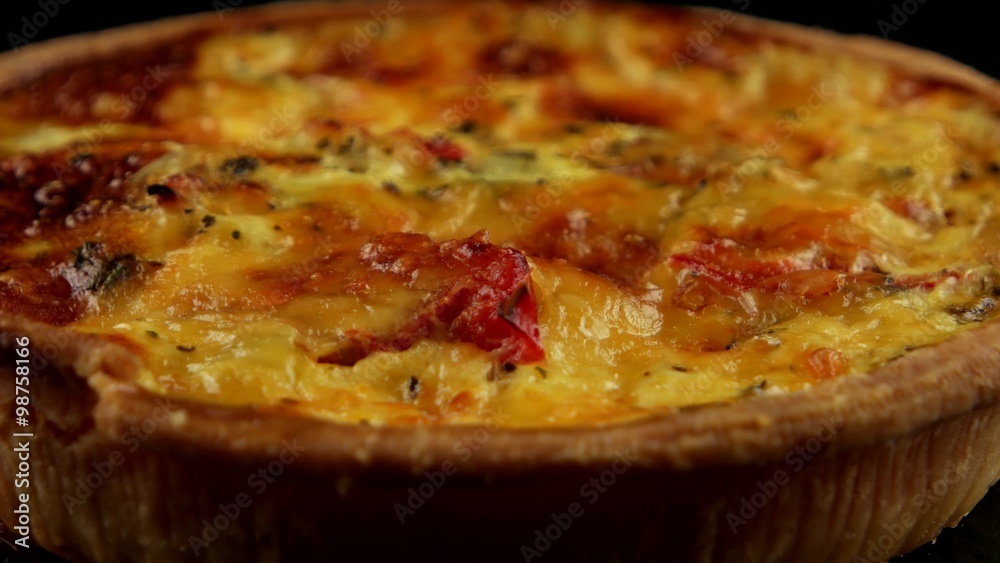 Quiche (pie) with cheese and vegetables
