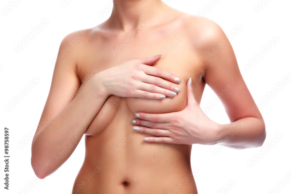 Female controlling breast for cancer, isolated on white Female controlling breast for cancer, isolated on white