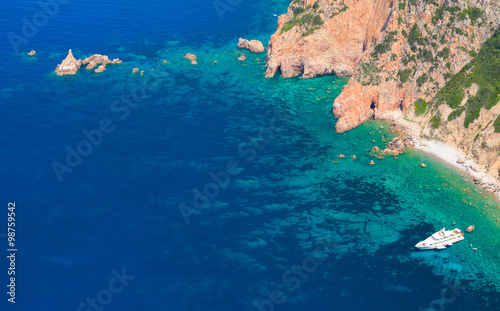 Pleasure yacht anchored near coast of Corsica