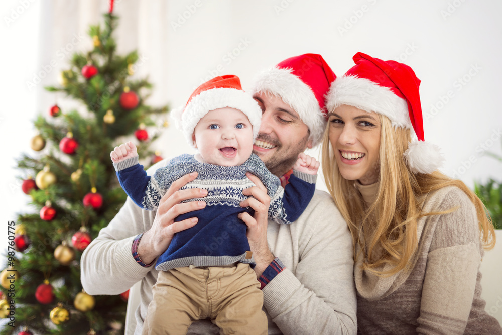 Happy family on Christmas Eve Happy family on Christmas Eve