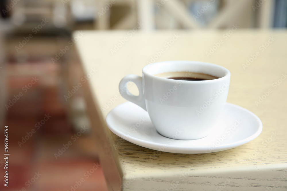 Cup of tasty coffee on cafe background Cup of tasty coffee on cafe background
