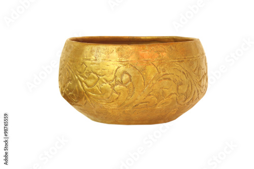 Old antique vintage brass bowl, isolated on white background