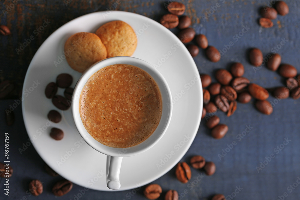 Cup of coffee on wooden table background Cup of coffee on wooden table background