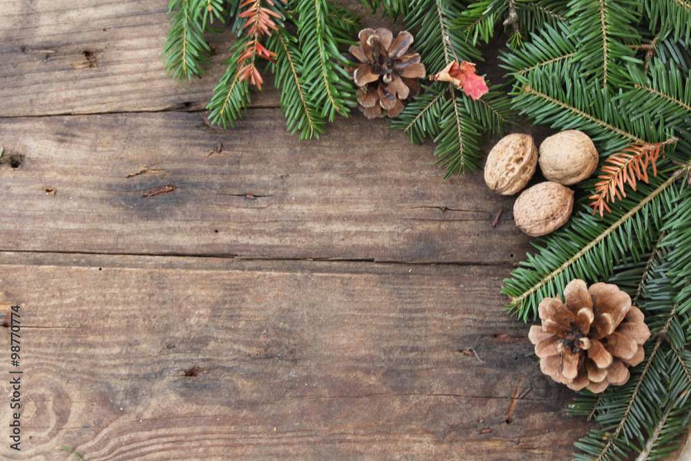 Christmas background with pine cone and fir branches - copy space and border design Christmas background with pine cone and fir branches - copy space and border design
