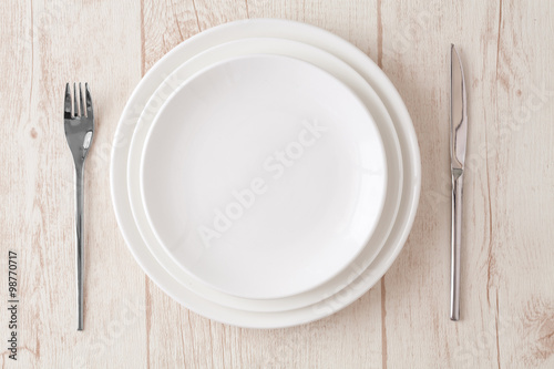 white plate fork knife