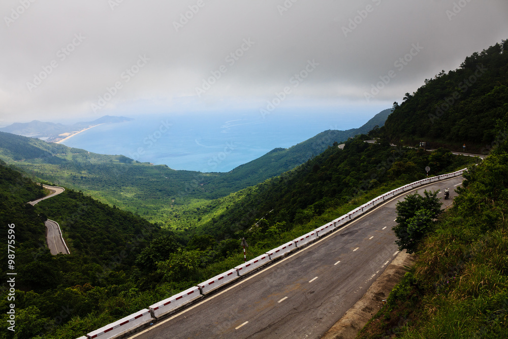 Lang Co beach from Hai Van pass, Hue, Viet Nam. Lang Co is an attractive island-like stretch of palm-shaded white sand, with a turquoise lagoon on one side and 10km of beachfront on the other. Lang Co beach from Hai Van pass, Hue, Viet Nam. Lang Co is an attractive island-like stretch of palm-shaded white sand, with a turquoise lagoon on one side and 10km of beachfront on the other.
