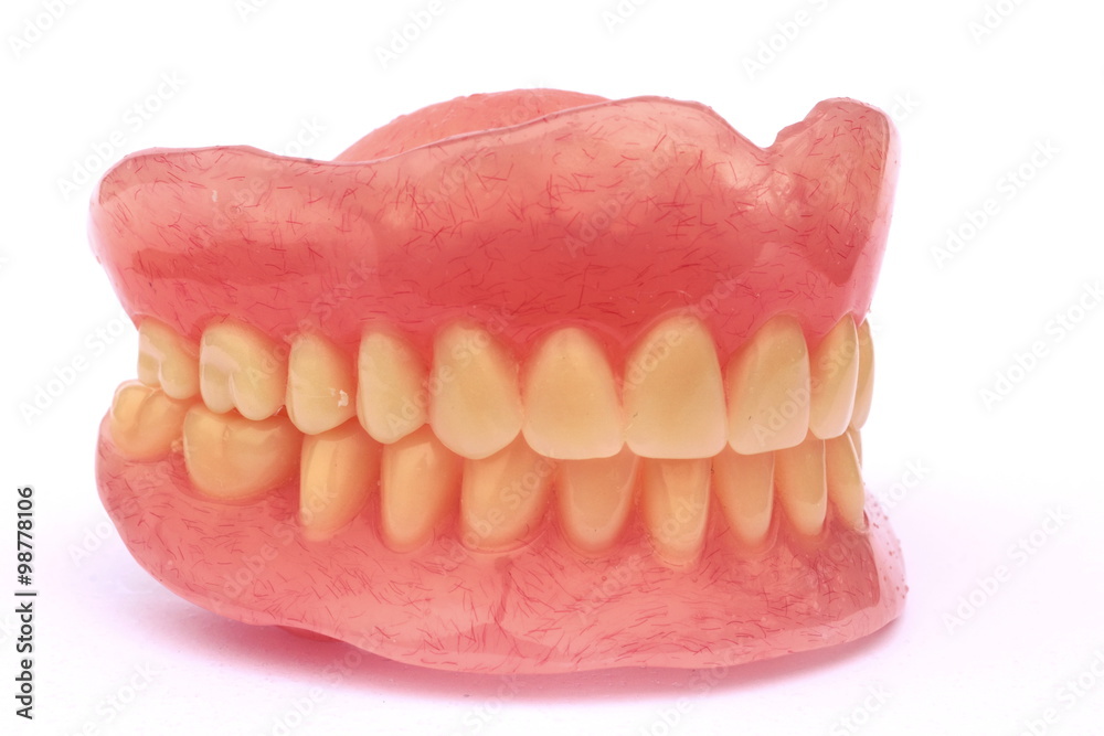 Obraz premium Close up of dental prosthetic isolated in white