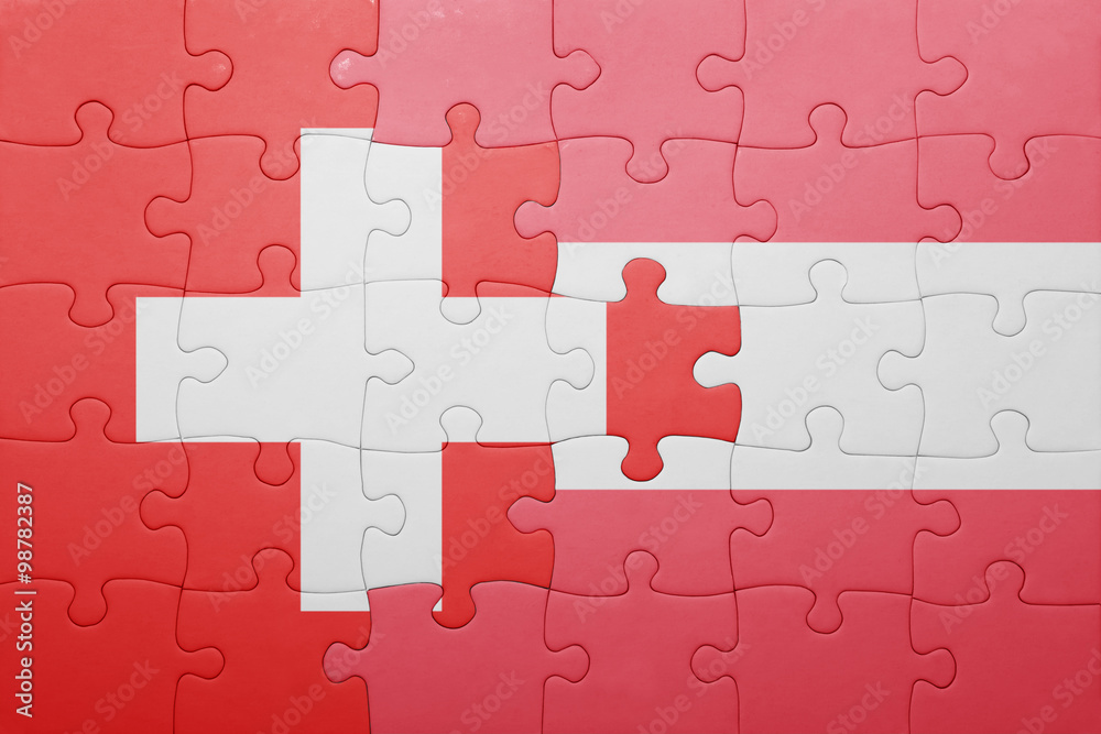 puzzle with the national flag of switzerland and austria puzzle with the national flag of switzerland and austria