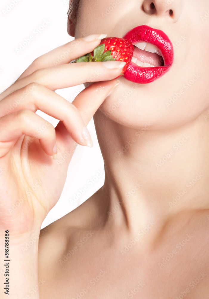 Red lips close up and strawberry Red lips close up and strawberry